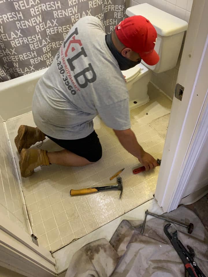 KLB at work on the bathroom floor